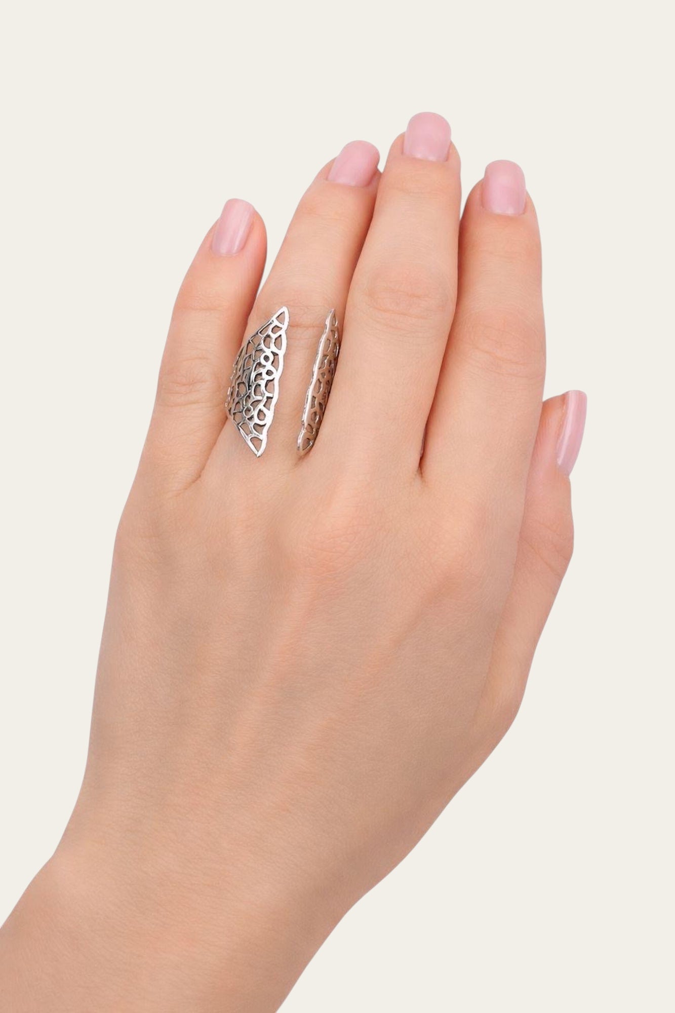 Time4Me adjustable silver-tone stainless steel ring with an intricate open-front filigree design on a woman's hand