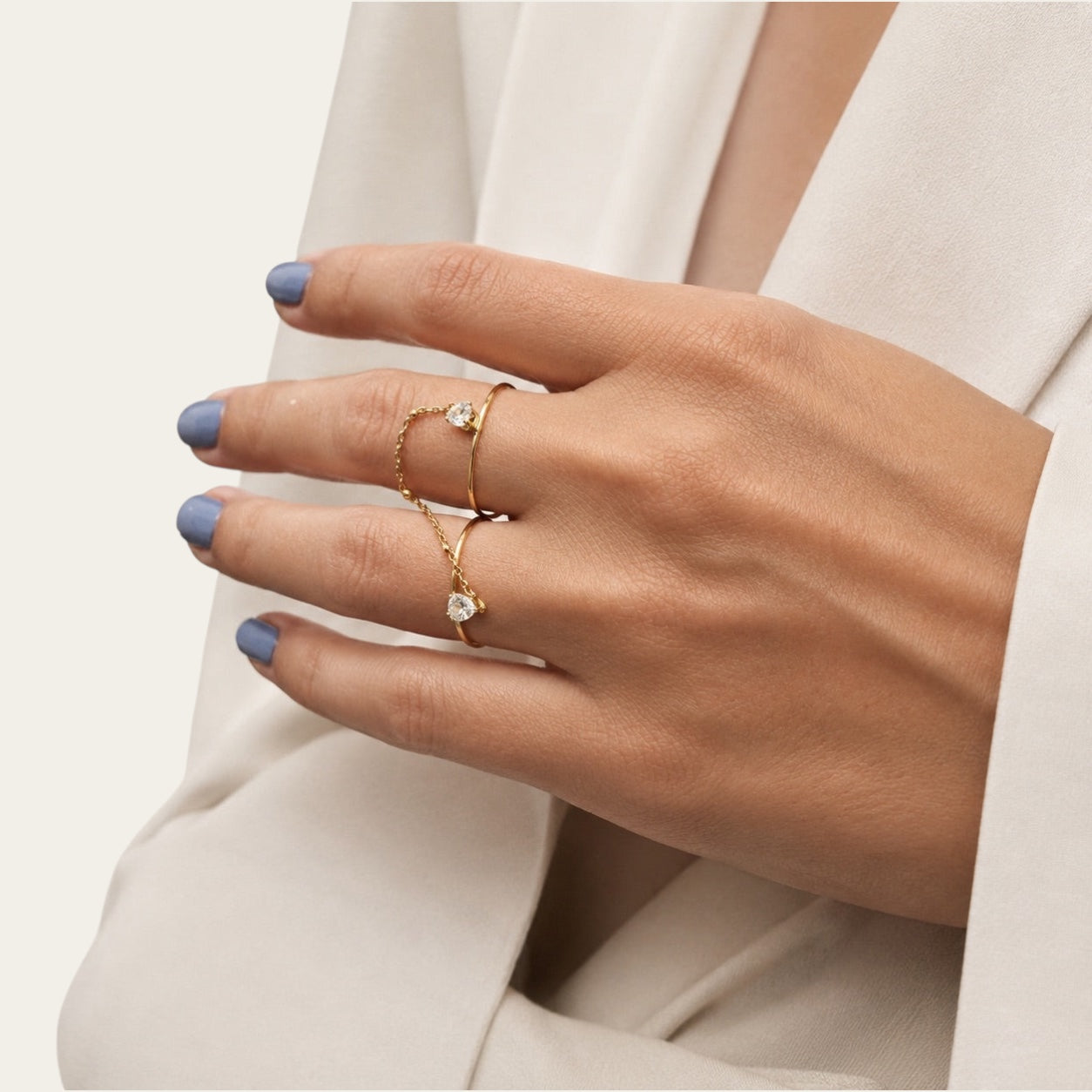 Time4Me gold adjustable double finger ring featuring delicate chains and sparkling rhinestone heart accents