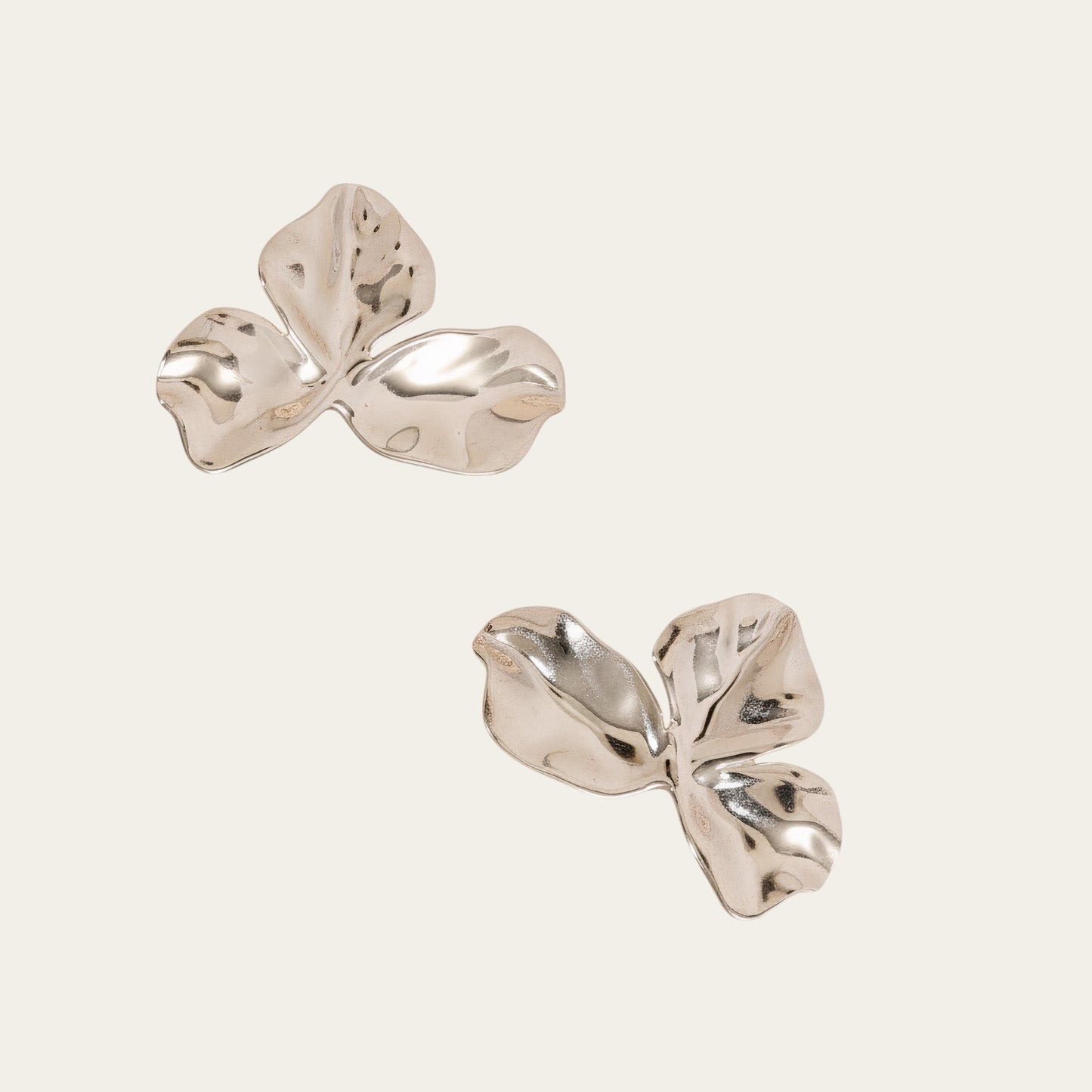 Time4Me gold-tone stainless steel earrings featuring a delicate wavy petal design for a versatile elegant look.