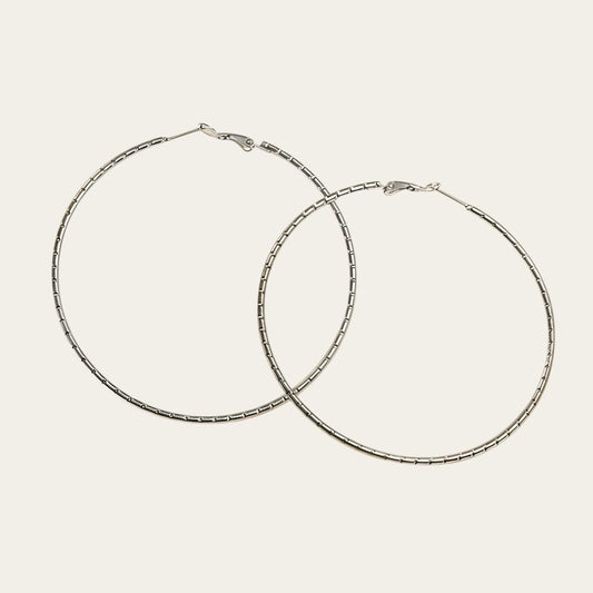 Time4Me large silver-tone stainless steel hoop earrings with a 7 cm diameter and textured surface