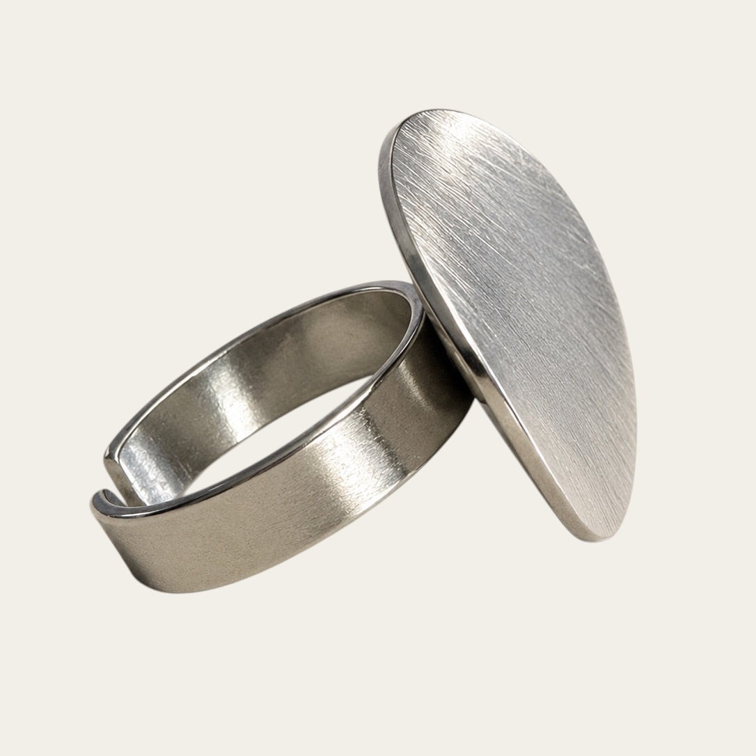 Time4Me adjustable silver-tone stainless steel ring featuring a round brushed metal disc design