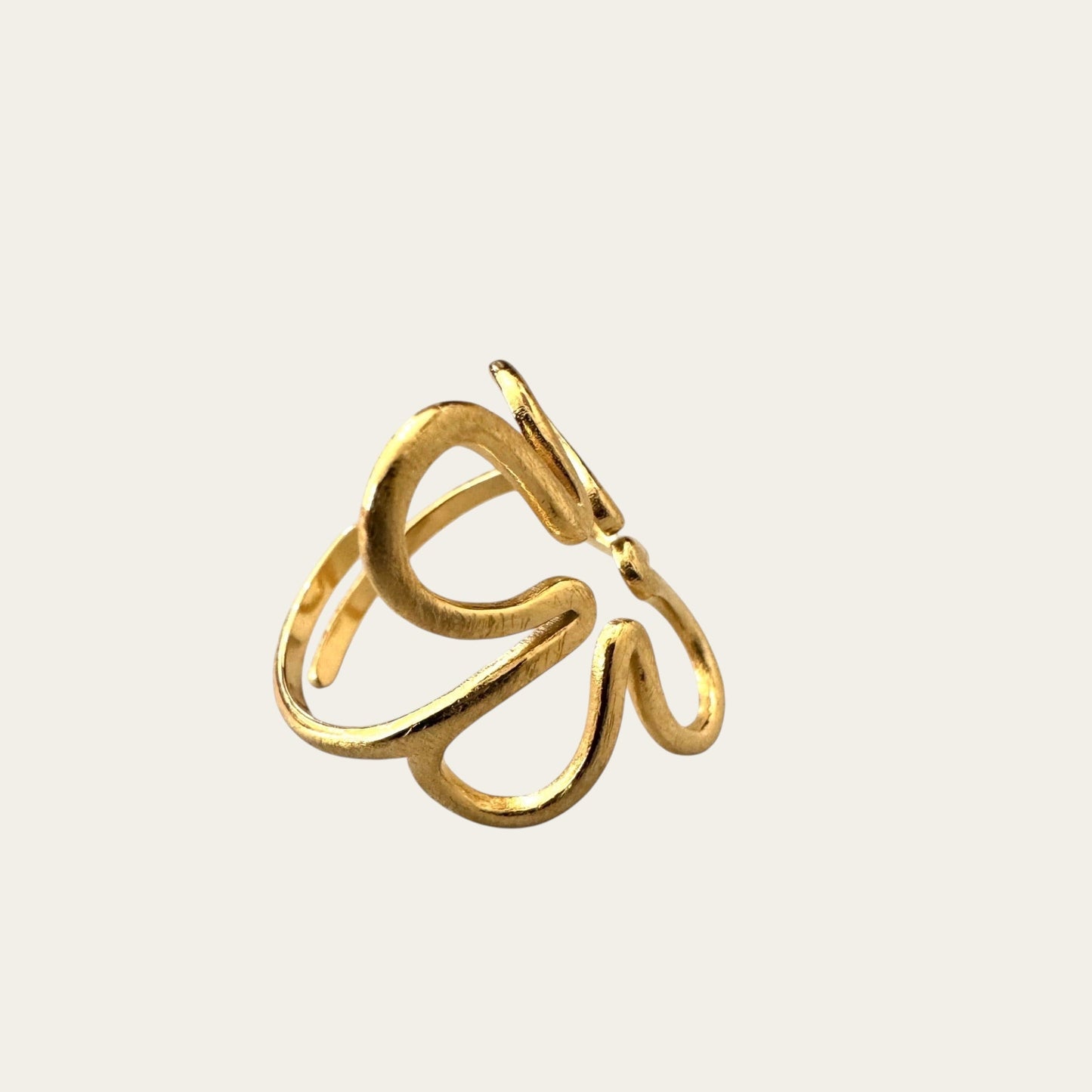 Time4Me adjustable gold stainless steel ring featuring a minimalist stylized flower design