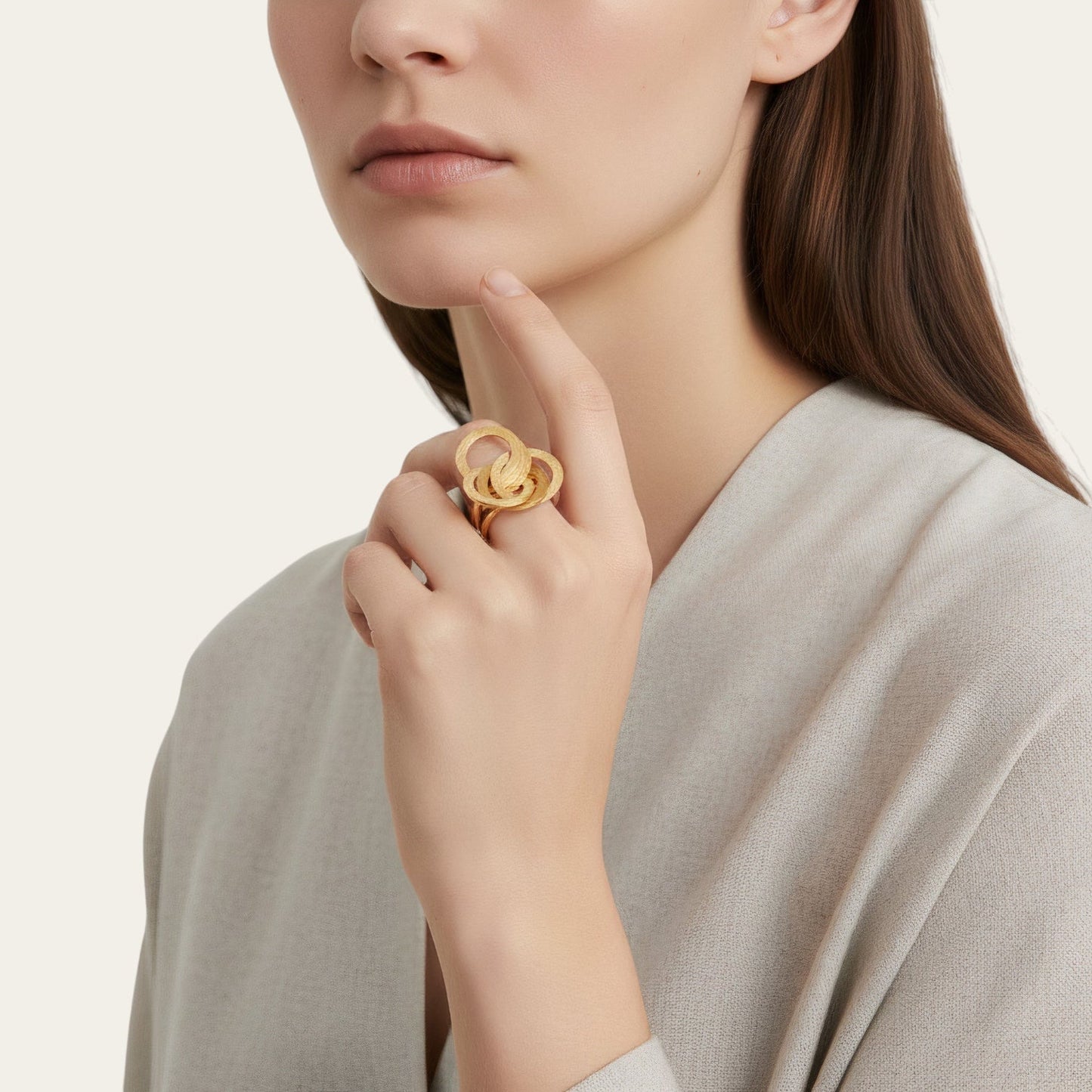 Time4Me adjustable gold geometric ring with textured circular design worn on a woman's finger