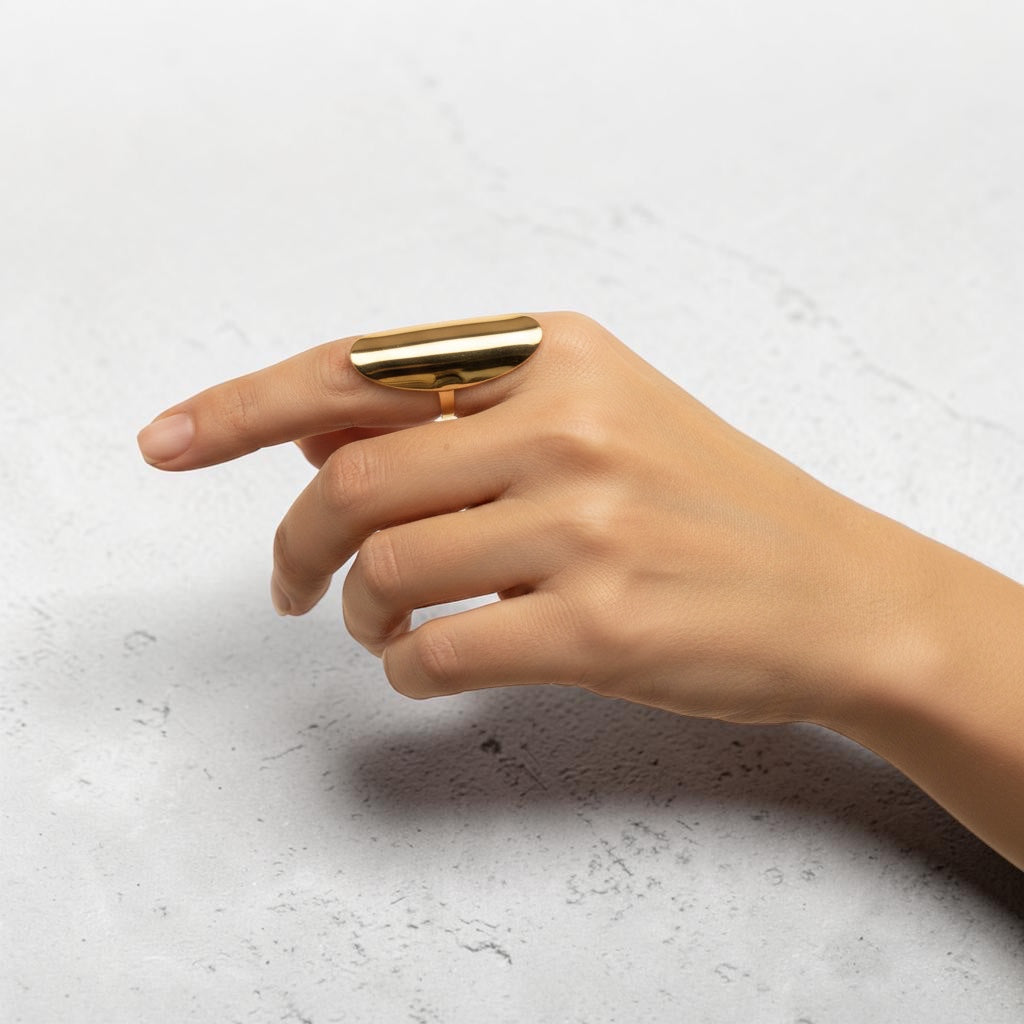 Time4Me adjustable gold-tone stainless steel ring with a smooth flat top design worn on a woman's finger