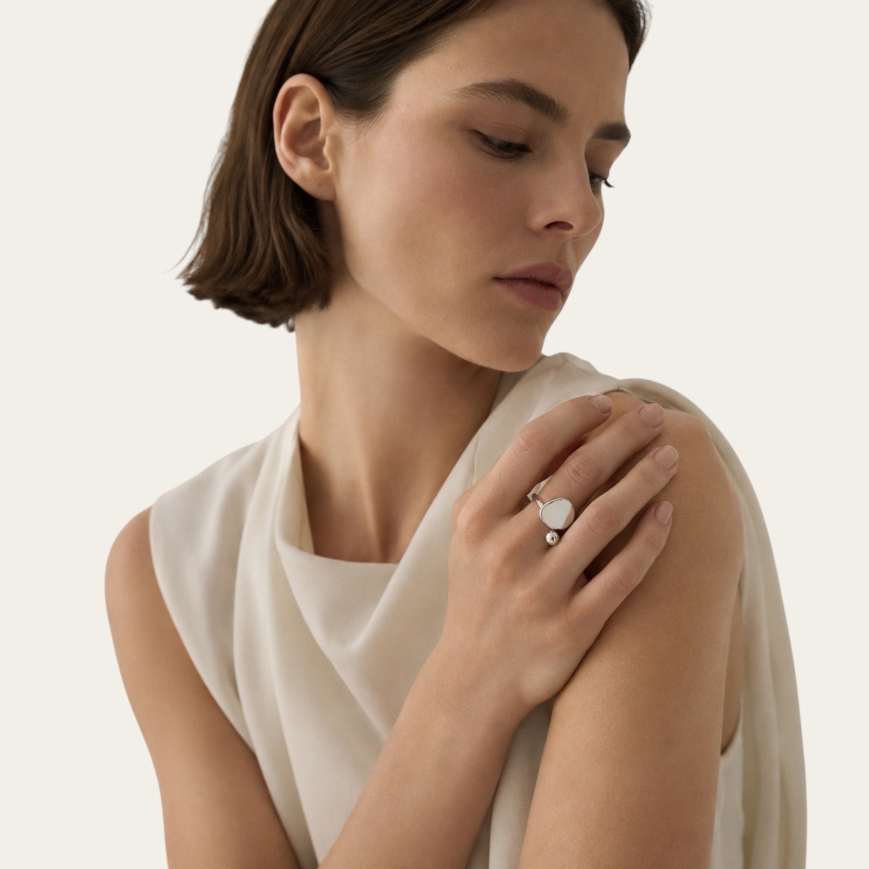 Time4Me adjustable silver-tone stainless steel open ring featuring a minimalist sphere and disc design on a model
