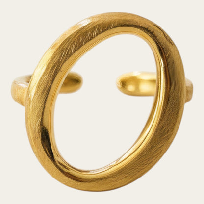 Time4Me adjustable oval ring in brushed gold stainless steel with a minimalist open design