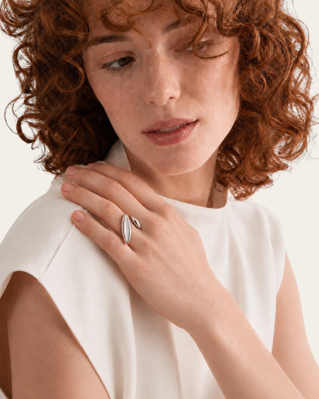 Time4Me duoform adjustable silver-tone stainless steel ring worn by a woman with curly red hair