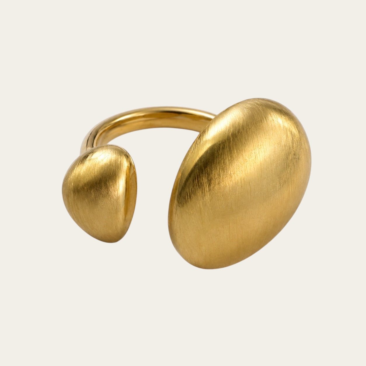 Time4Me gold adjustable ring with asymmetrical brushed metal shapes and an open front design