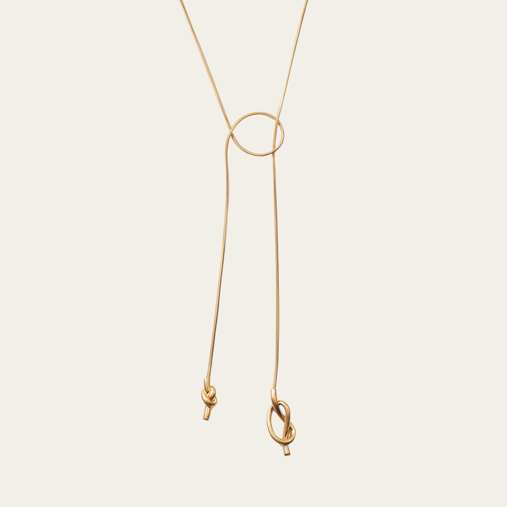 Time4Me 100cm gold-tone stainless steel long necklace featuring an elegant asymmetrical knot design