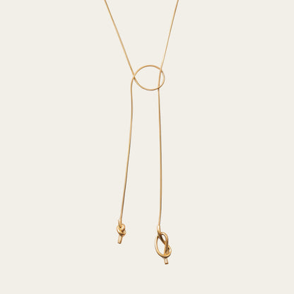 Time4Me 100cm gold-tone stainless steel long necklace featuring an elegant asymmetrical knot design
