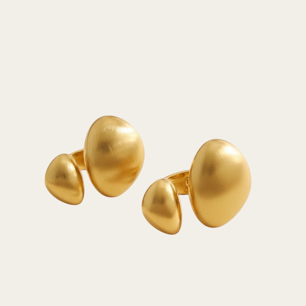 Time4Me gold adjustable ring with asymmetric brushed metal shapes and an open front design