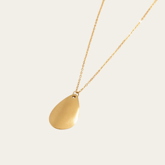 Time4Me gold-tone stainless steel necklace featuring a minimalist brushed teardrop pendant on a delicate chain