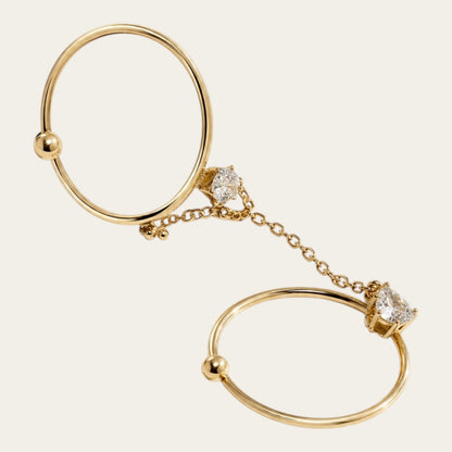 Time4Me adjustable gold double finger ring featuring a delicate chain and sparkling heart-shaped rhinestone accents