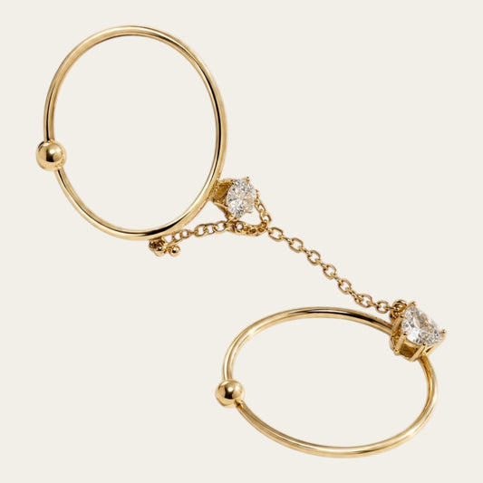 Time4Me adjustable gold double finger ring featuring a delicate chain and sparkling heart-shaped rhinestone accents