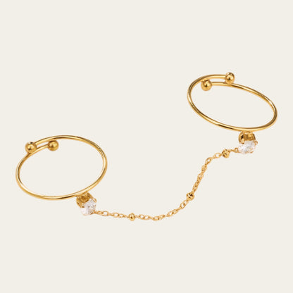 Time4Me adjustable gold-tone double finger ring featuring a delicate chain and sparkling rhinestone heart accents.