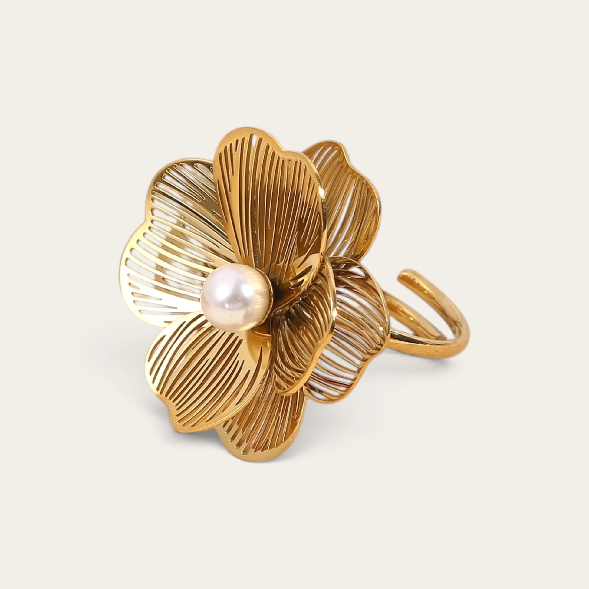 Time4Me vintage style adjustable gold-tone stainless steel ring featuring a delicate openwork flower and central pearl