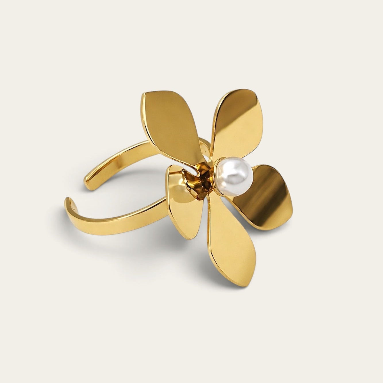 Time4Me gold stainless steel adjustable ring featuring a polished flower design with a central white pearl accent