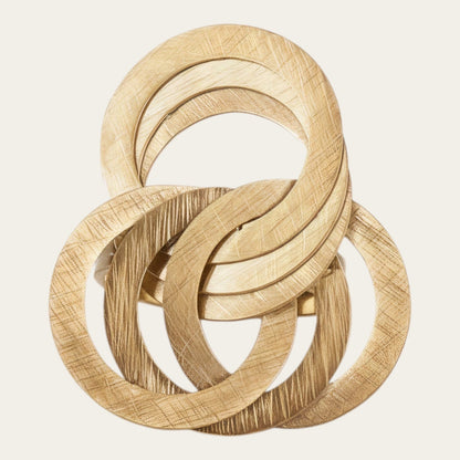 Time4Me gold-tone adjustable geometric ring featuring interlocking brushed metal circles in a modern design.