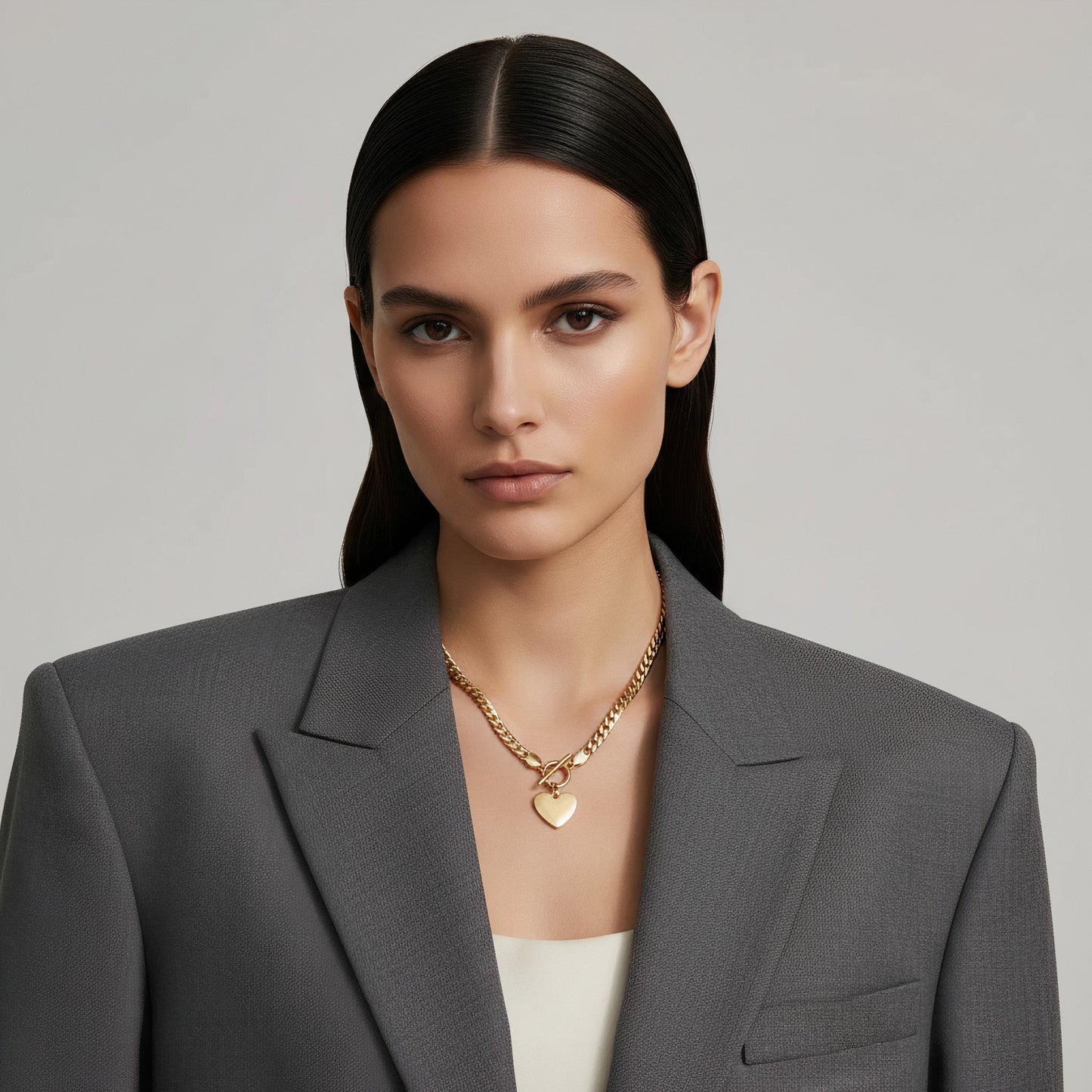 Time4Me gold stainless steel gourmet chain necklace with a toggle clasp and smooth heart pendant on a model