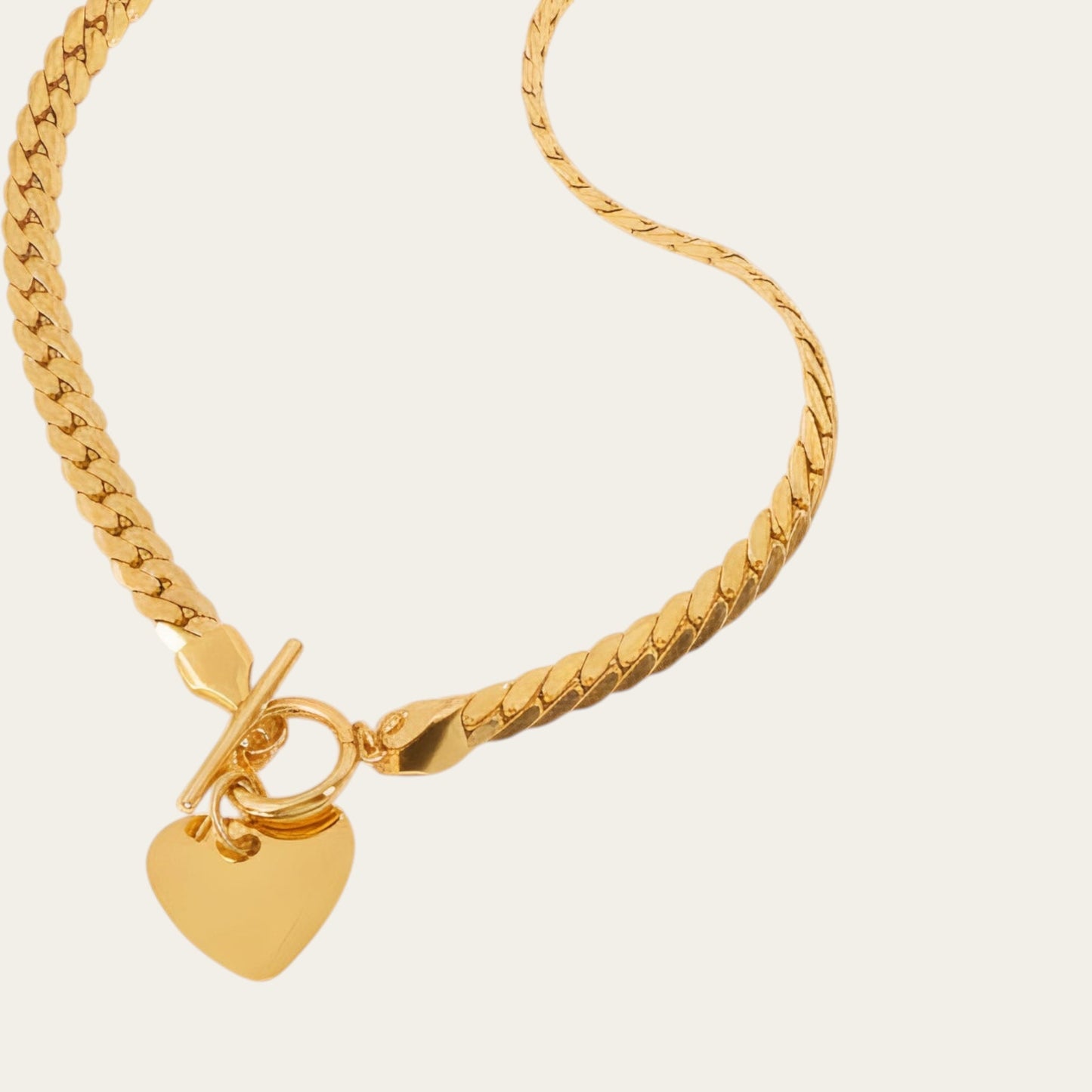 Time4Me gold stainless steel gourmette chain necklace featuring a toggle clasp and a smooth heart pendant