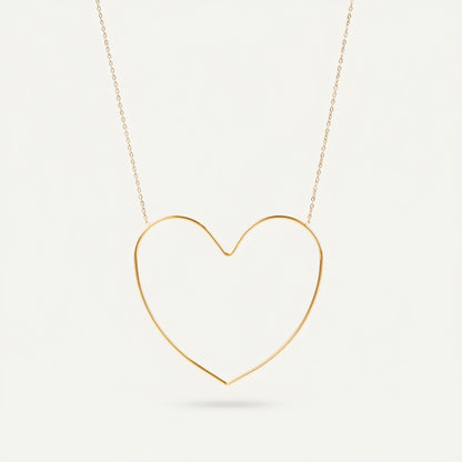 Time4Me gold-tone stainless steel necklace featuring a minimalist stylized open heart pendant on a delicate chain.