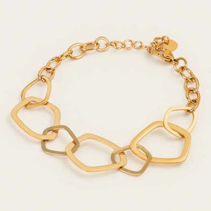Time4Me gold-tone stainless steel bracelet featuring irregular geometric links and a secure lobster clasp closure.