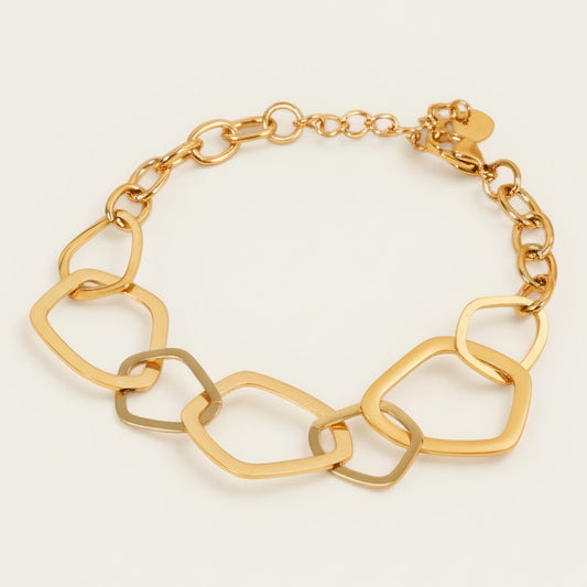 Time4Me gold-tone stainless steel bracelet featuring irregular geometric links and a secure lobster clasp closure.