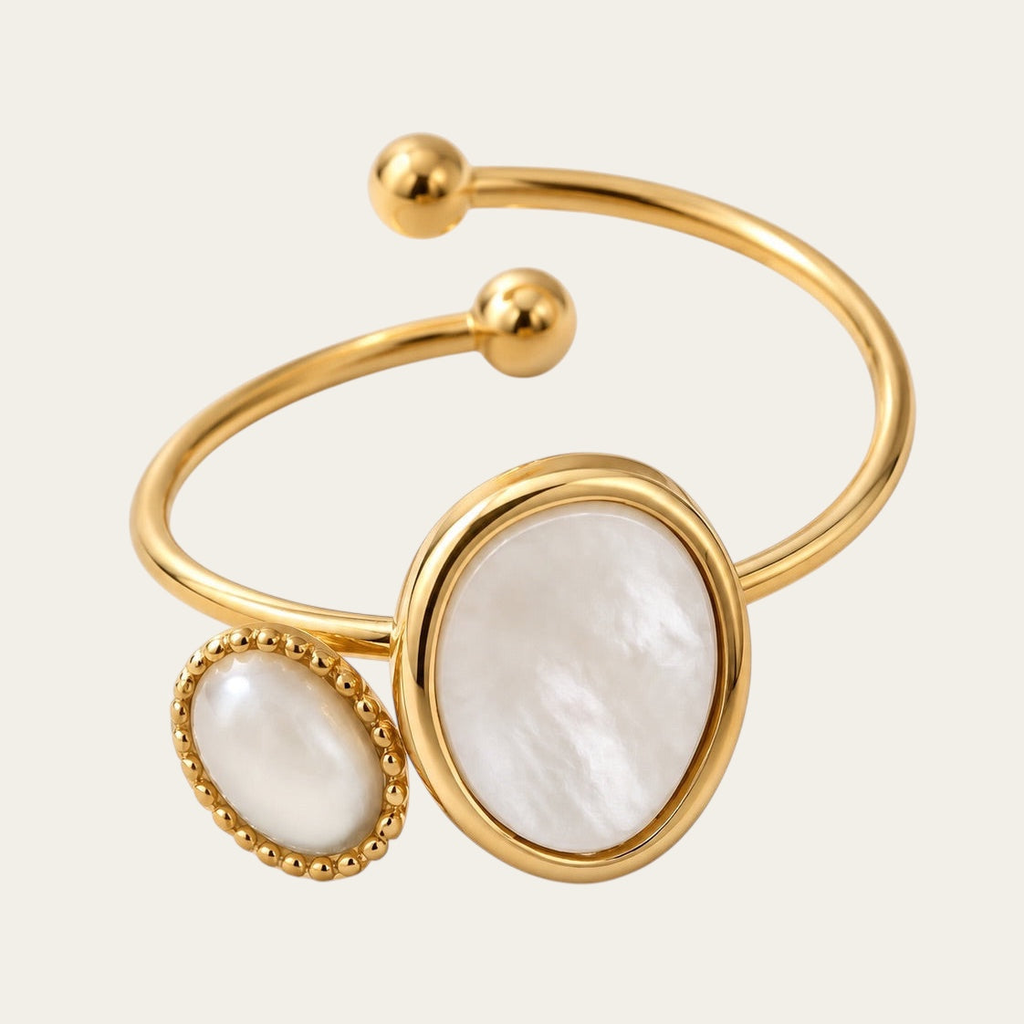 Time4Me adjustable gold stainless steel ring featuring a white pearl and mother of pearl inlay in an open design.