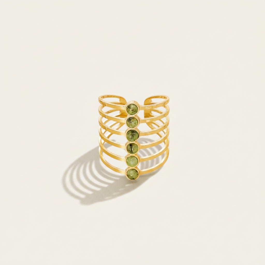 Time4Me adjustable gold-tone stainless steel multi-band ring featuring a vertical row of small green stones