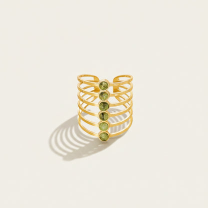 Time4Me adjustable gold-tone stainless steel multi-band ring featuring a vertical row of small green stones