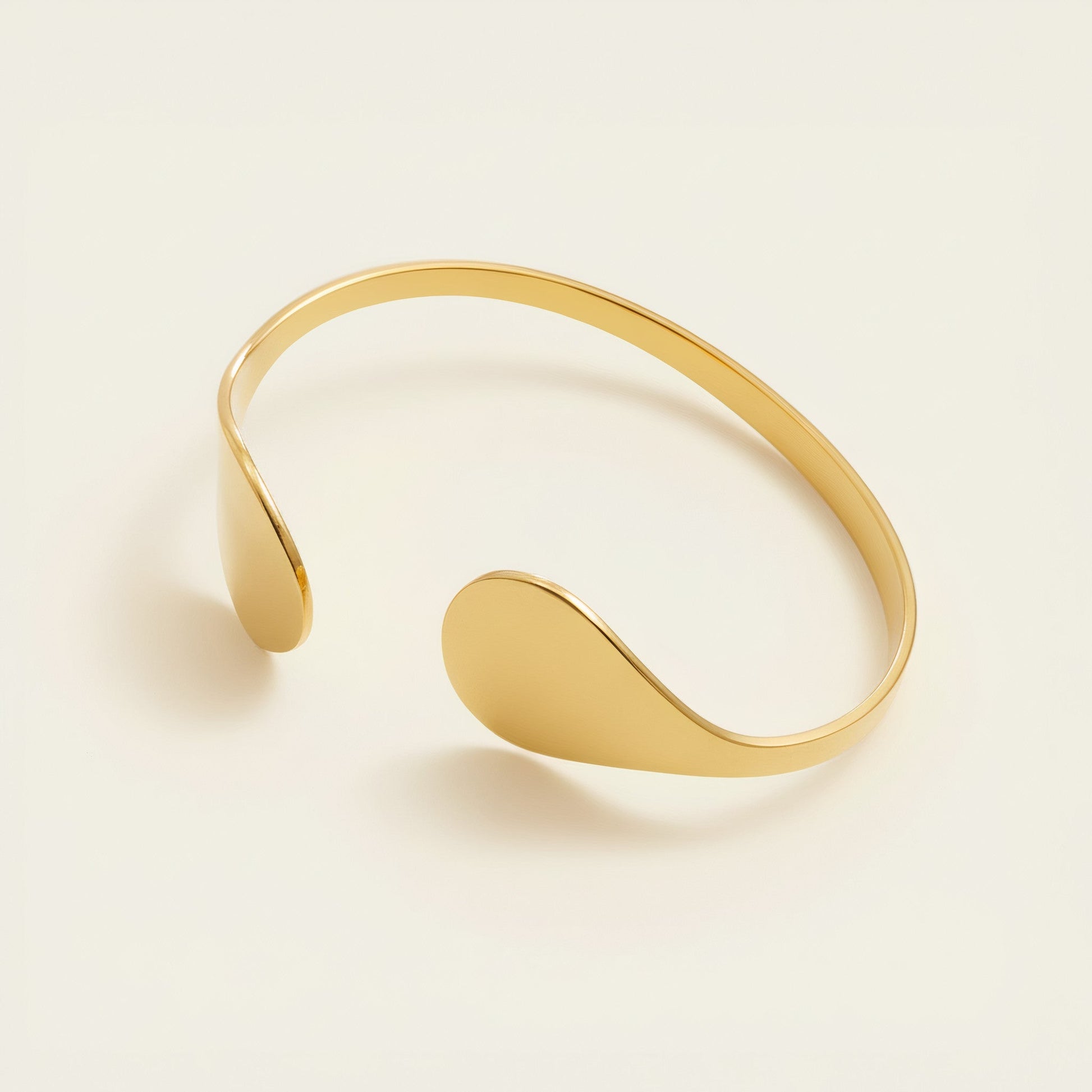 Time4Me gold open cuff bracelet with teardrop-shaped ends made of durable stainless steel