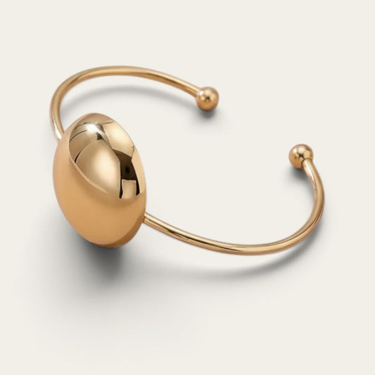 Time4Me gold open cuff bracelet made of stainless steel with a smooth polished round accent bead