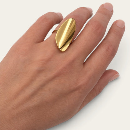 Time4Me adjustable gold-tone stainless steel ring with a modern polished oval design worn on a woman's finger