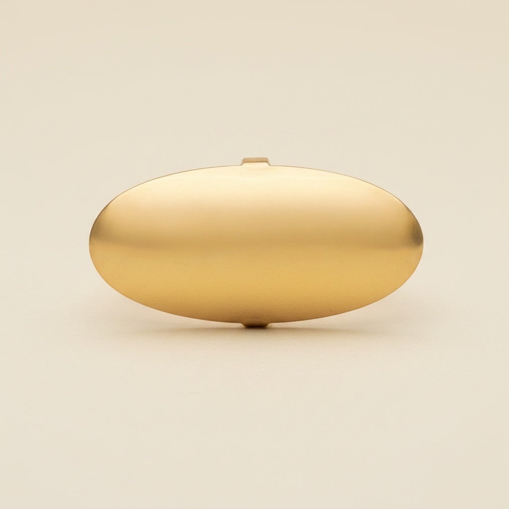 Time4Me gold-tone smooth oval adjustable ring made of stainless steel on a neutral background