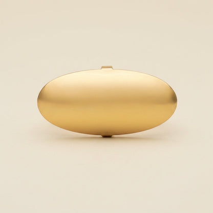 Time4Me gold-tone smooth oval adjustable ring made of stainless steel on a neutral background