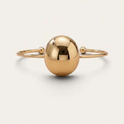 Time4Me gold open cuff bracelet featuring a polished central sphere and delicate ball-tipped ends in stainless steel