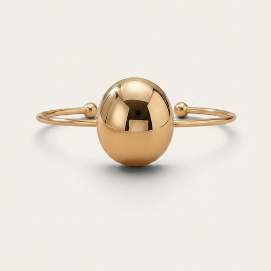 Time4Me gold open cuff bracelet featuring a polished central sphere and delicate ball-tipped ends in stainless steel