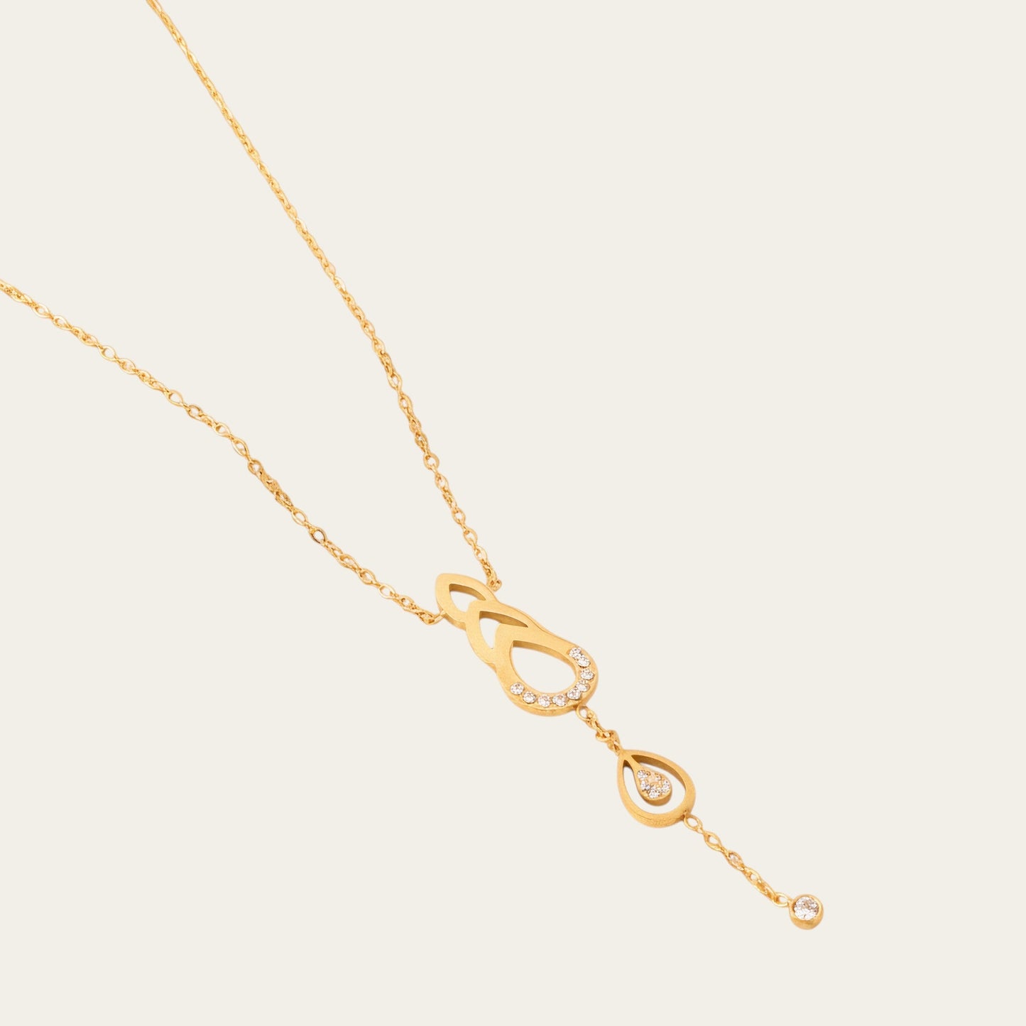 Time4Me gold stainless steel necklace featuring delicate teardrop cutouts and sparkling rhinestone accents
