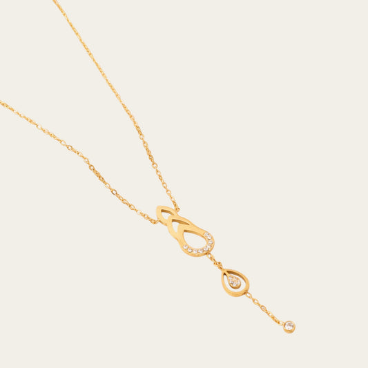 Time4Me gold stainless steel necklace featuring delicate teardrop cutouts and sparkling rhinestone accents