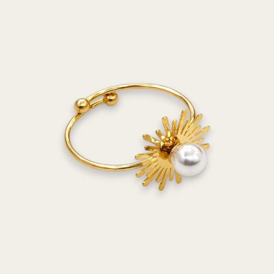 Time4Me adjustable gold-tone stainless steel ring featuring a sunburst design with a central white pearl accent.