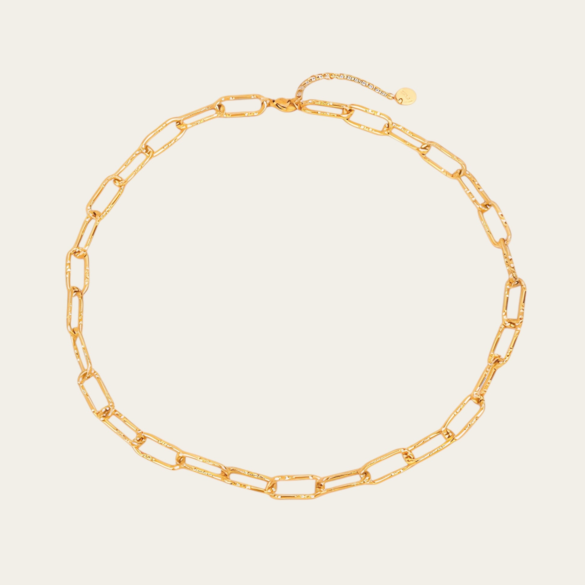 Time4Me gold chain necklace with elongated textured links and a shimmering finish in stainless steel