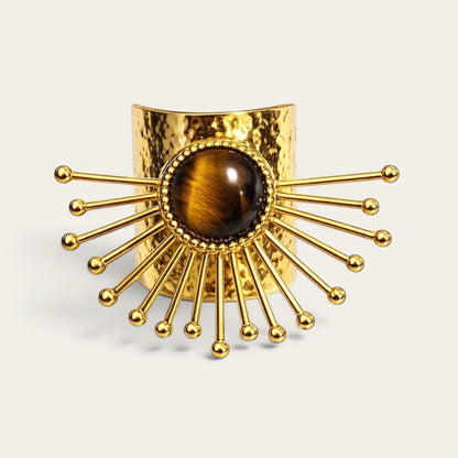 Time4Me gold-tone stainless steel cuff ring featuring a central tiger eye stone and sunburst design
