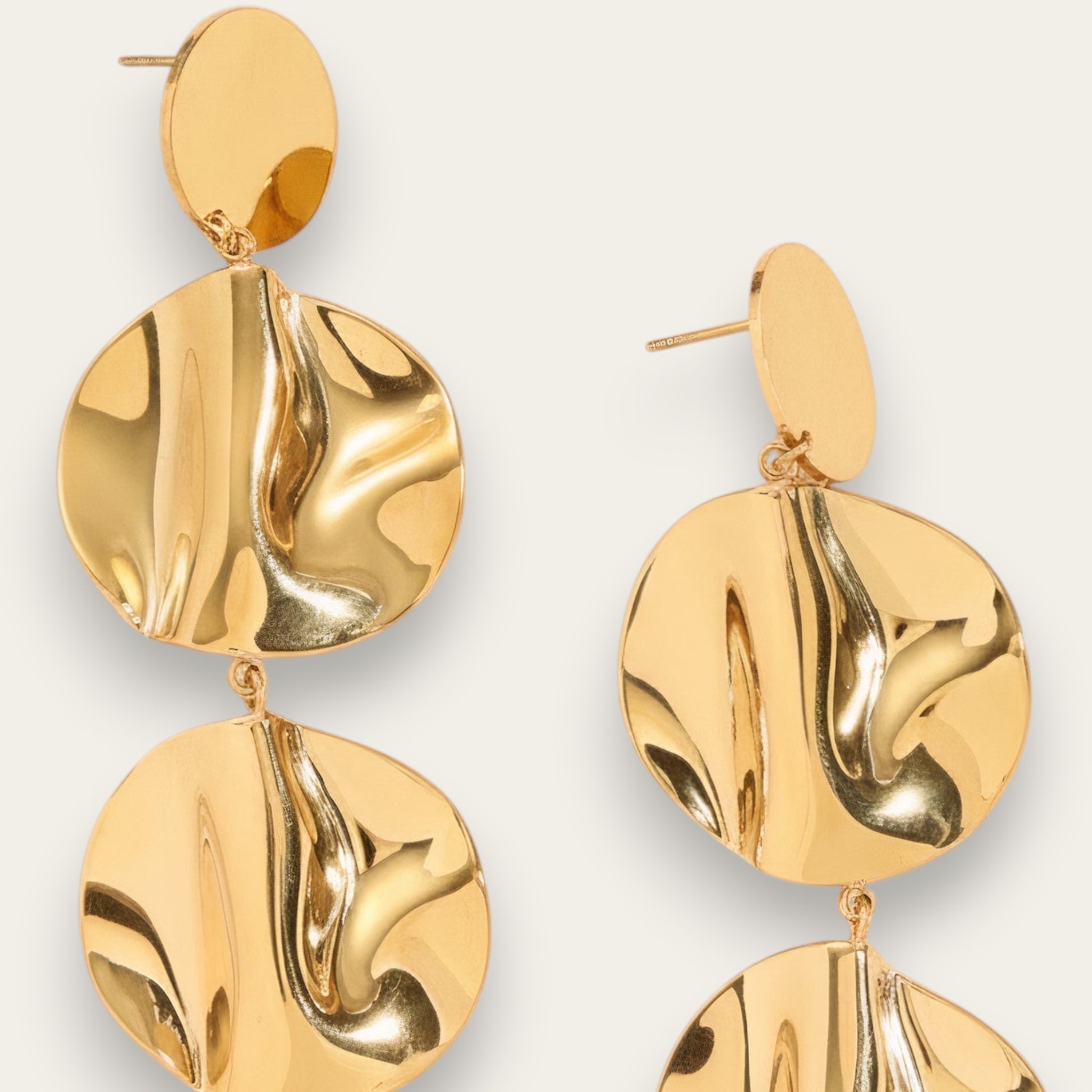Time4Me gold-tone stainless steel drop earrings featuring three wavy, polished circular discs for a modern look.