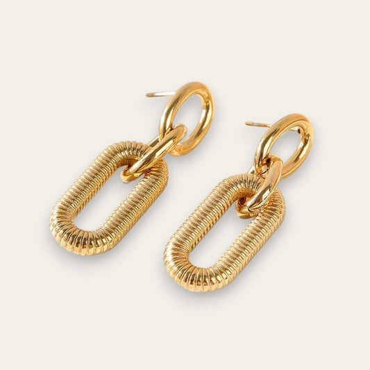 Time4Me long gold-tone stainless steel drop earrings featuring textured oval chain links on a neutral background.