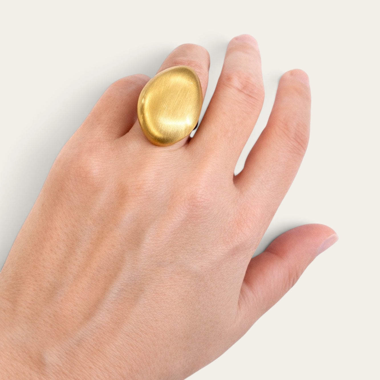 Time4Me adjustable gold-tone satin finish stainless steel ring worn on a hand
