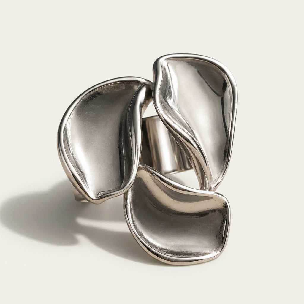 Time4Me adjustable silver-tone stainless steel ring featuring a sculptural three-petal floral design