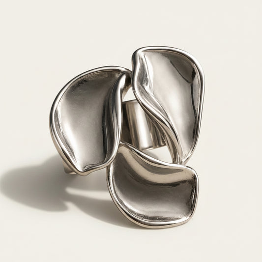 Time4Me adjustable silver-tone stainless steel ring featuring a sculptural three-petal floral design