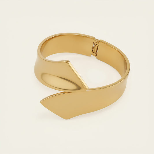 Time4Me sculptural gold-tone open cuff bracelet made of durable stainless steel with a modern geometric design.