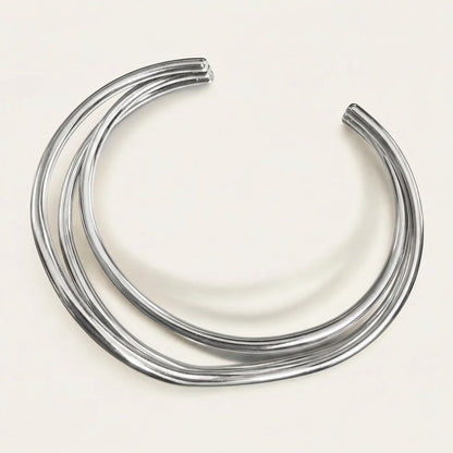 Time4Me silver open cuff bracelet with overlapping lines made of durable stainless steel