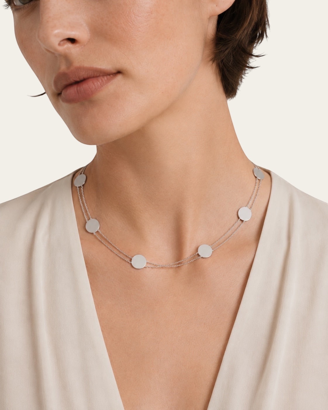 Time4Me silver double chain choker necklace featuring multiple small disc pendants worn on a model